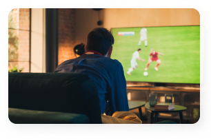 Fans watching live sports on a TV